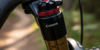 mountain bike fork suspension close up showing air valve and 20260331 101717